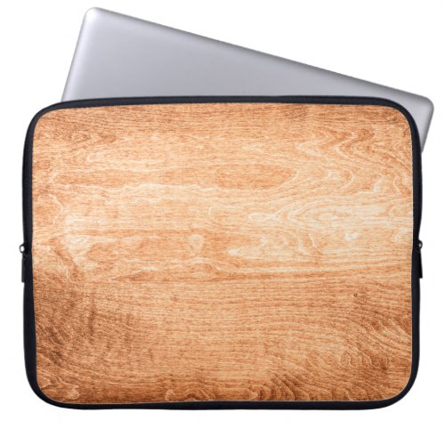 Dark wood texture background surface with old natu laptop sleeve