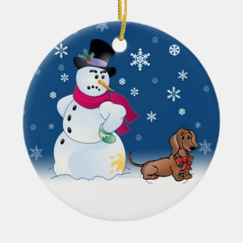Daschund Puppy And Snowman Ceramic Ornament by cleverpupart at Zazzle