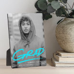 Dashed Turquoise Graduation Photo Plaque<br><div class="desc">Celebrate your graduate’s achievement with a personalized graduation photo keepsake featuring their vertical photo and the word “Grad” in bright turquoise handwritten lettering with a stylish dash underneath. This custom graduation photo plaque is perfect for high school or college grads and can be personalized with the graduate’s name, school, and...</div>