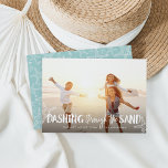 Dashing Through the Sand | Holiday Photo Card<br><div class="desc">Perfect for those living in tropical climes, or for sharing a favorite beach vacation photo, our coastal chic holiday photo card features "Dashing Through the Sand" as a white text overlay adorned with starfish illustrations. Personalize with your names and custom greeting (shown with "warmest wishes") along the bottom. Cards reverse...</div>