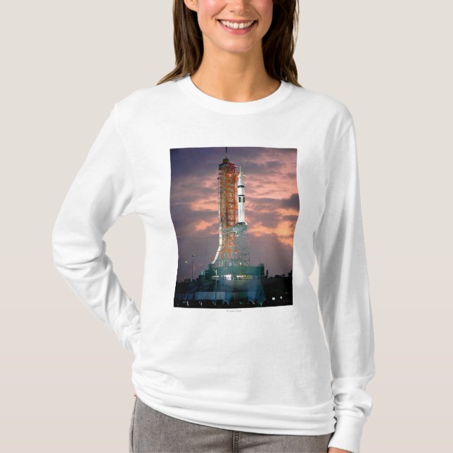 Dawn breaks behind ASTP Saturn IB CDDT T-Shirt (Front)