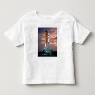 Dawn breaks behind ASTP Saturn IB CDDT Toddler T-shirt
