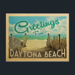 Daytona Beach Vintage Travel Postcard<br><div class="desc">This Greetings From Daytona Beach vintage postcard design features a sandy beach with a beautiful turquoise ocean water and above the sea,  a blue sky with billowy white clouds. In vintage travels style.</div>