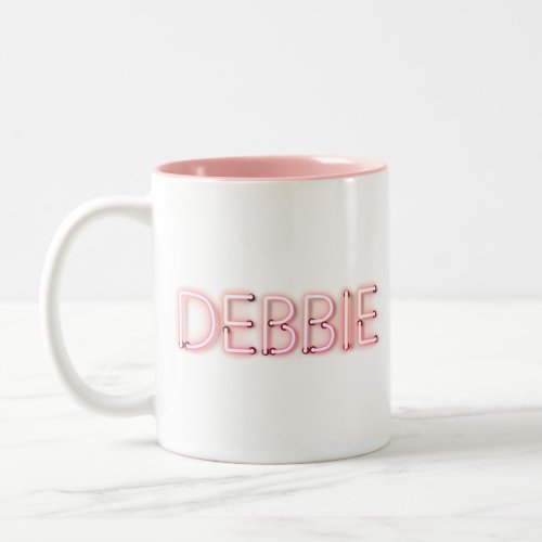 Debbie name in glowing neon lights Two_Tone coffee mug
