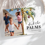 Deck the Palms Beach Christmas Holiday Card<br><div class="desc">Tired of the same old snowy Christmas cards? Shake things up this year with our unique beach-themed holiday cards. Our cards feature a festive blend of tropical palm trees adorned with Christmas ornaments and the playful 'Deck the Palms' saying. Personalize by adding your family name, the year, and your favorite...</div>