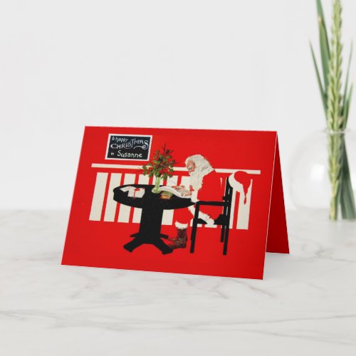 Deco Santa at table with list Greeting Card