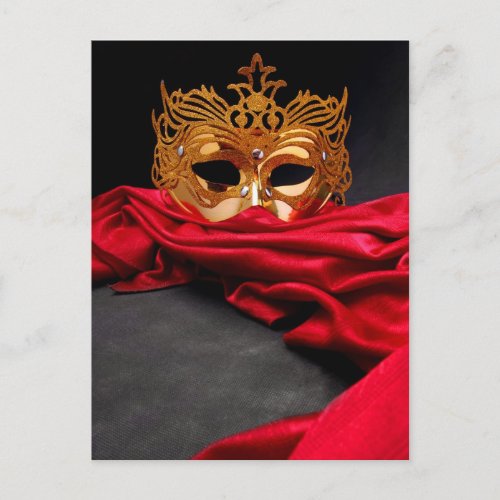 Decorated mask for masquerade on red velvet postcard