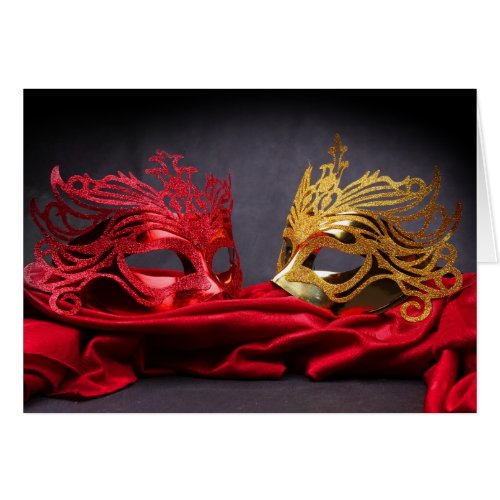 Decorated masquerade mask on red velvet