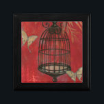 Decorative Birdcage with Butterflies Jewelry Box<br><div class="desc">Two pale butterflies hover around a birdcage in this painting by Norman Wyatt. Leaves hang over the birdcage,  and it all rests on a crimson background. Order this print today!</div>