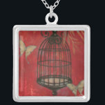 Decorative Birdcage with Butterflies Silver Plated Necklace<br><div class="desc">Two pale butterflies hover around a birdcage in this painting by Norman Wyatt. Leaves hang over the birdcage,  and it all rests on a crimson background. Order this print today!</div>