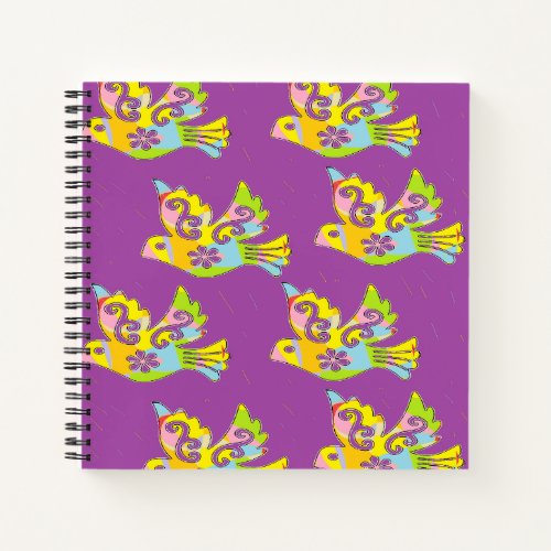 decorative birds on purple notebook