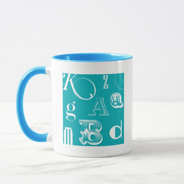 Decorative Letters on Blue Background Mug (Left)