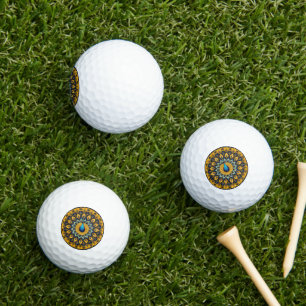 Decorative peacock bird on white golf balls