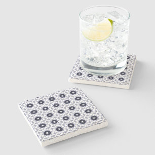 decorative pillow featuring a geometric pattern stone coaster