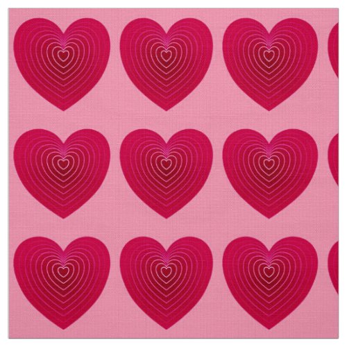 Deep rose red hearts on a pale pink background fabric