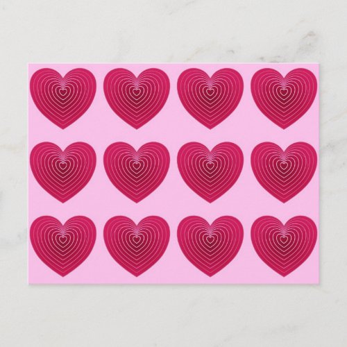 Deep rose red hearts on a pale pink background postcard