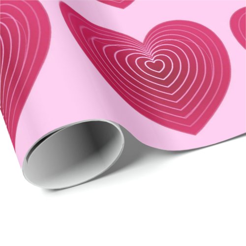 Deep rose red hearts on a pale pink background wrapping paper