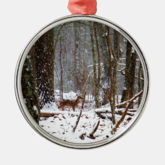 Deer in the snow fall metal ornament