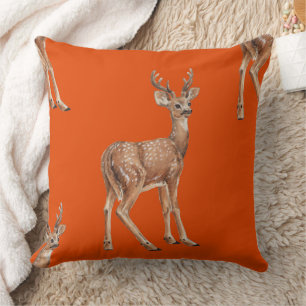 Deer on red throw pillow