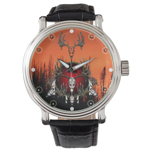 Deer skulls and feathers watch