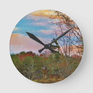 Deer with a Pink blue sky Round Clock