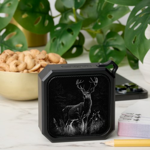 Deer with antlers framed by field and tree       bluetooth speaker