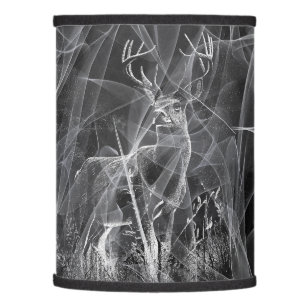 Deer with antlers framed by field and tree lamp shade