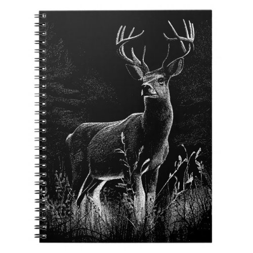 Deer with antlers framed by field and tree      notebook