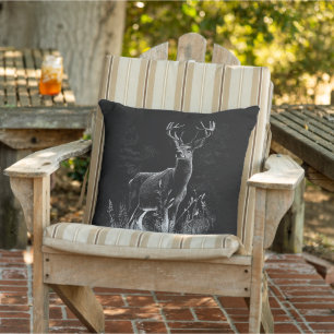 Deer with antlers framed by field and tree outdoor pillow