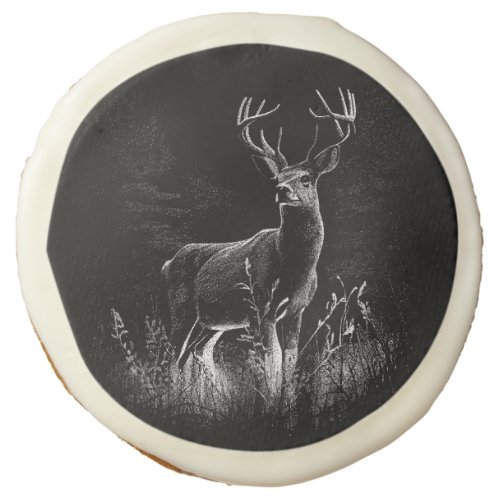 Deer with antlers framed by field and tree       sugar cookie