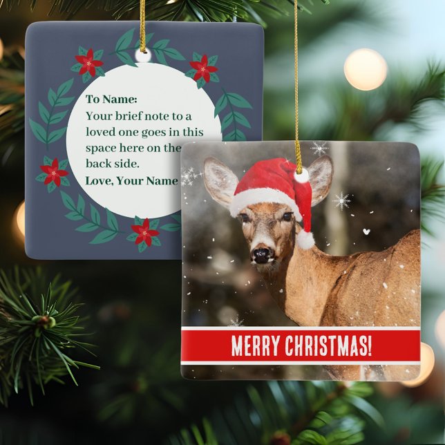 Deer with Christmas Hat in the Snow Whimsical   Ceramic Ornament (A sweet deer square ceramic ornament with custom text on the front and back is personal and unique.)