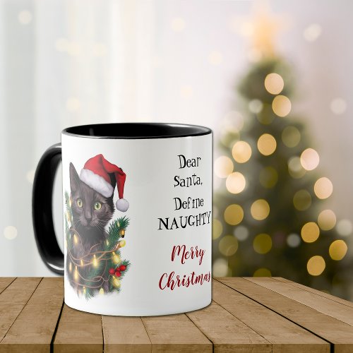 Define Naughty Cat Tangled in Christmas Lights Mug