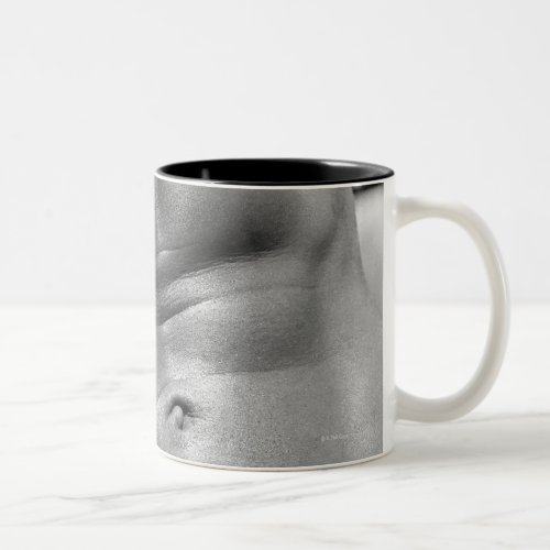 Defined abdomen of bodybuilder Two_Tone coffee mug