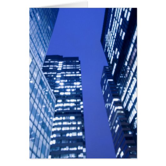 Defocused upward view of office building windows cards (Front)