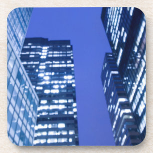 Defocused upward view of office building windows drink coaster