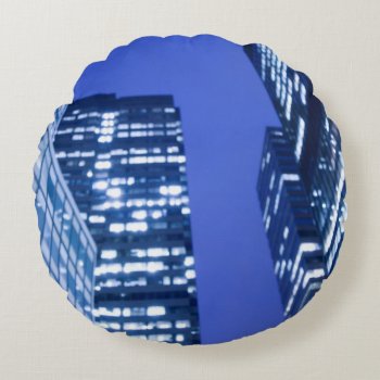 Defocused Upward View Of Office Building Windows Round Pillow by iconicnewyork at Zazzle
