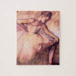 Degas Pink Ballerina Puzzle<br><div class="desc">Degas Pink Ballerina puzzle. Oil on canvas from 1900. French artist Edgar Degas painted some of the prettiest ballet paintings of the impressionist movement. Pink Ballerina is a pastel featuring a pretty ballerina wearing a pink tutu stretching before the ballet. A great gift for fans of Ballet, Ballerinas, Degas, and...</div>