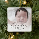 Delicate Baby's First Christmas Newborn Photo Ceramic Ornament<br><div class="desc">This delicate baby's first Christmas newborn photo ceramic ornament is the perfect modern Christmas tree decoration. The romantic minimalist design features lovely and elegant black typography with a clean and simple look. This keepsake ornament reads "first Christmas". Personalize your double-sided ornament with a photo of your baby, your baby's name...</div>