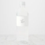 Delicate Black Calligraphy Monogram Wedding Water Bottle Label<br><div class="desc">These delicate black calligraphy monogram wedding water bottle labels are perfect for a modern wedding. The romantic minimalist design features lovely and elegant black typography on a white background with a clean and simple look. These labels add a beautiful detailed touch to your wedding reception, rehearsal dinner, engagement party, or...</div>