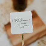 Delicate Black Calligraphy Wedding Welcome Square Sticker<br><div class="desc">These delicate black calligraphy wedding welcome stickers are perfect for a modern wedding. The romantic minimalist design features lovely and elegant black typography on a white background with a clean and simple look. Personalize these stickers with the location of your wedding, names, and wedding date. These labels are perfect for...</div>