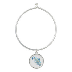 Delicate blue flowers with butterfly bangle bracelet