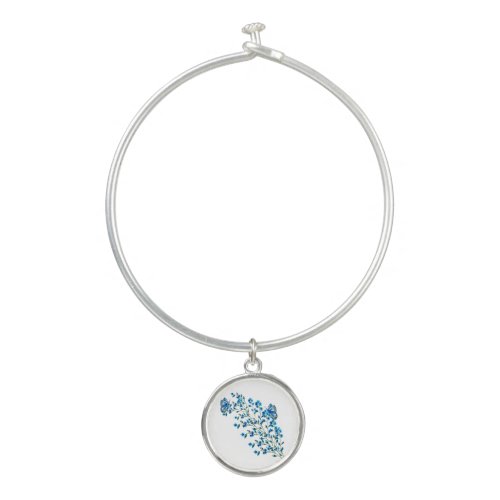 Delicate blue flowers with butterfly bangle bracelet