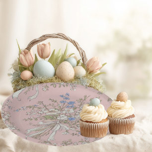Delicate bouquet of wild flowers on a pink backgro paper plates