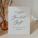 Delicate Calligraphy Presence is Greatest Gift Pedestal Sign<br><div class="desc">This delicate calligraphy your presence is our greatest gift pedestal sign is perfect for a modern wedding. The romantic minimalist design features lovely and elegant black typography on a white background with a clean and simple look.</div>