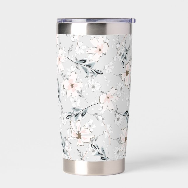 Delicate floral pattern.  insulated tumbler (Left)