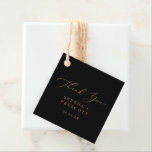 Delicate Gold Calligraphy | Black Thank You Favor Tags<br><div class="desc">These delicate gold calligraphy black thank you favor tags are perfect for a modern wedding. The romantic minimalist design features lovely and elegant champagne golden yellow typography on a black background with a clean and simple look. Customize these tags with your names and date. Change the wording to suit any...</div>