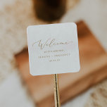 Delicate Gold Calligraphy Wedding Welcome Square Sticker<br><div class="desc">These delicate gold calligraphy wedding welcome stickers are perfect for a modern wedding. The romantic minimalist design features lovely and elegant champagne golden yellow typography on a white background with a clean and simple look. Personalize these stickers with the location of your wedding, names, and wedding date. These labels are...</div>