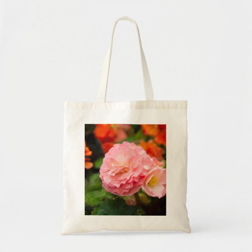 Delicate pink flower after the rain    tote bag