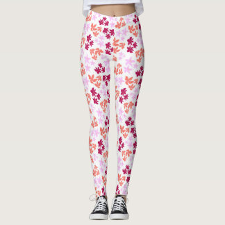 Delicate red and pink floral pattern on soft white leggings