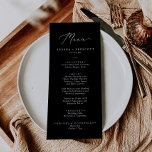 Delicate White on Black Calligraphy Wedding Dinner Menu<br><div class="desc">This delicate white on black calligraphy wedding dinner menu card is perfect for a modern wedding. The romantic minimalist design features lovely and elegant white typography on a black background with a clean and simple look. This menu can be used for a wedding reception,  rehearsal dinner,  or any event.</div>